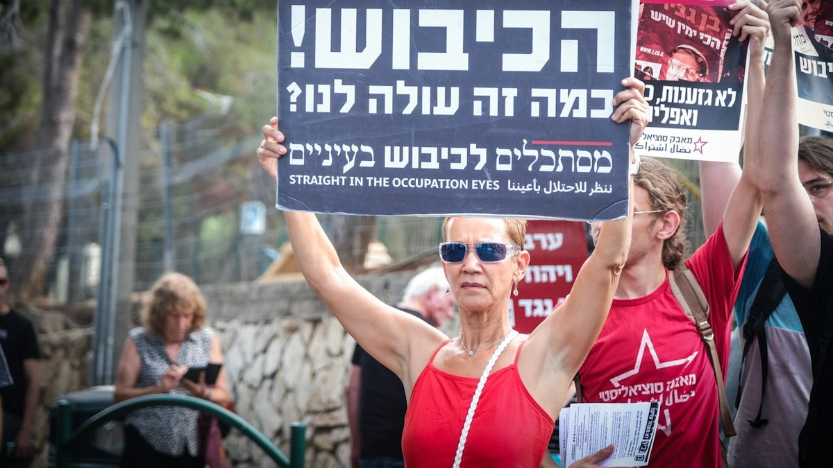 a person holding a sign
